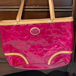 Pink embossed patent leather Coach bag